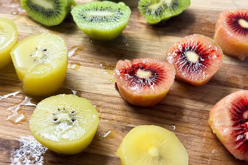 three colors of kiwi cut away from skins.