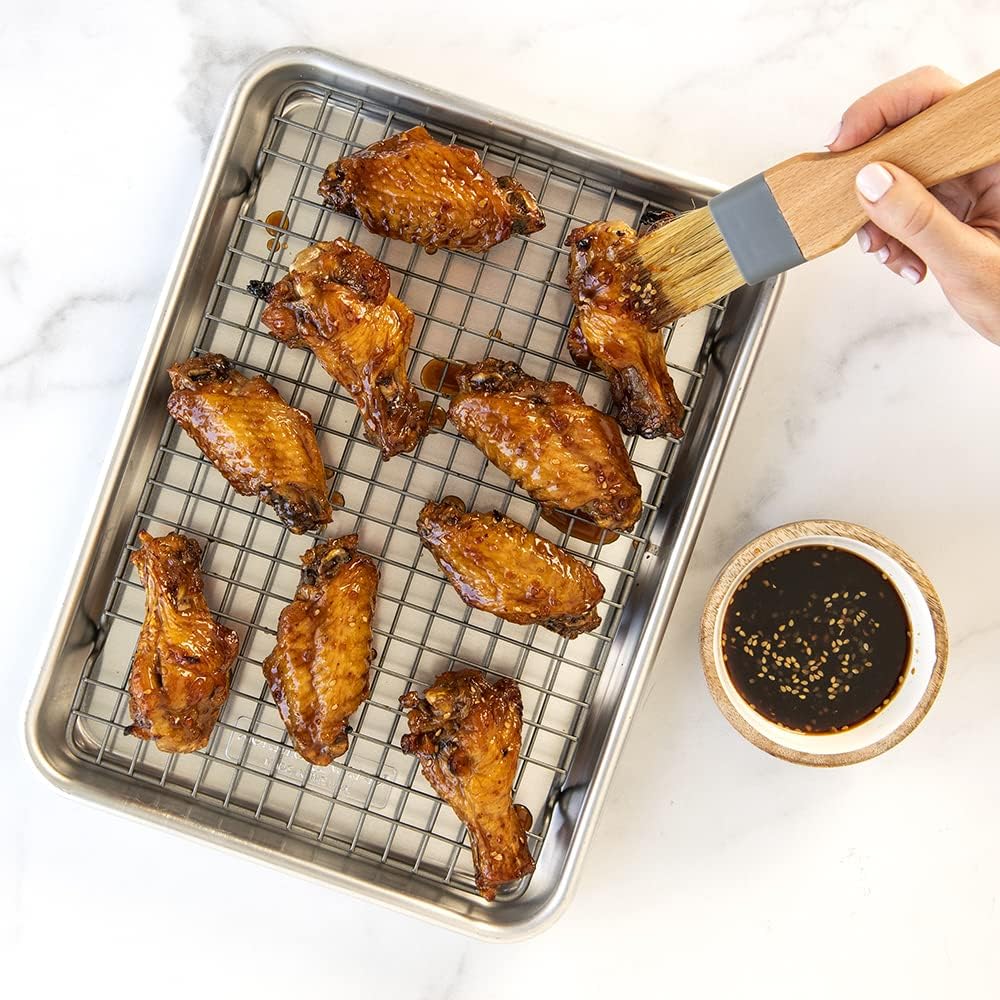 sheet pan with rack and chicken.