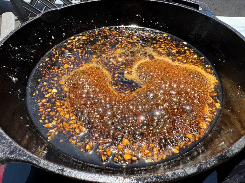sauce cooking in skillet.