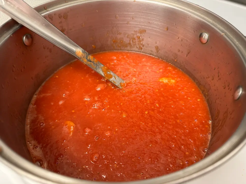 pot of pureed tomatoes.