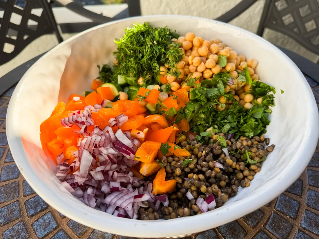 SWEET AND SPICY LENTIL AND GARBANZO BEAN SALAD ingredients in a bowl.