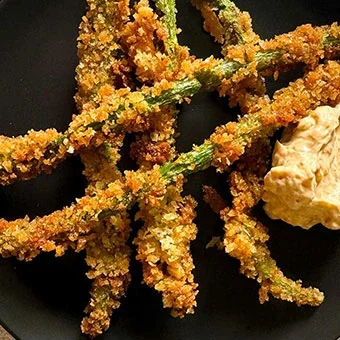 parmesan asparagus on a plate.